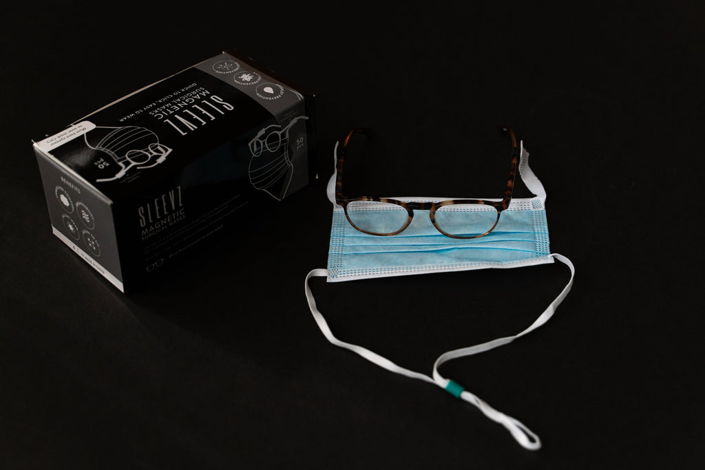 SLEEVZ box of 50 disposable masks with a mask attached to glasses