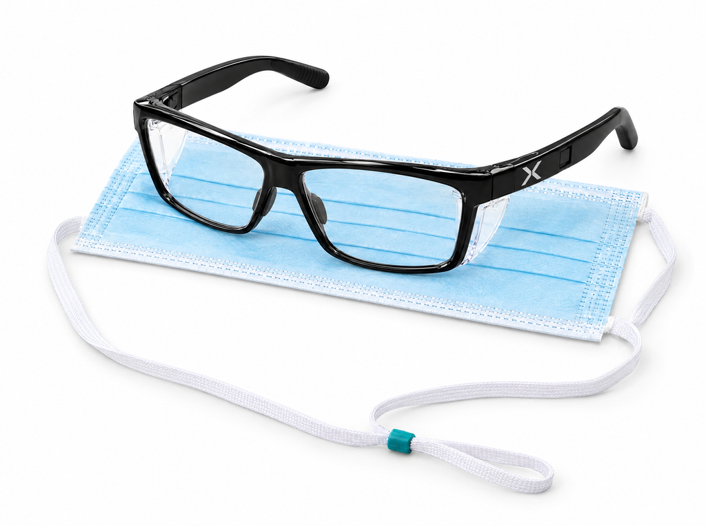 SLEEVZ X Safety Glasses resting on a SLEEVZ disposable mask